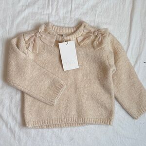 Zara cream sweater with bow details
